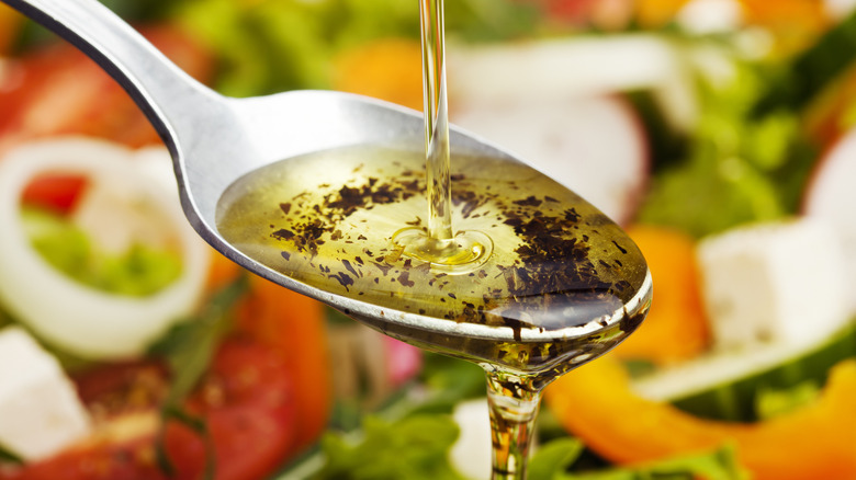 salad dressing in a spoon