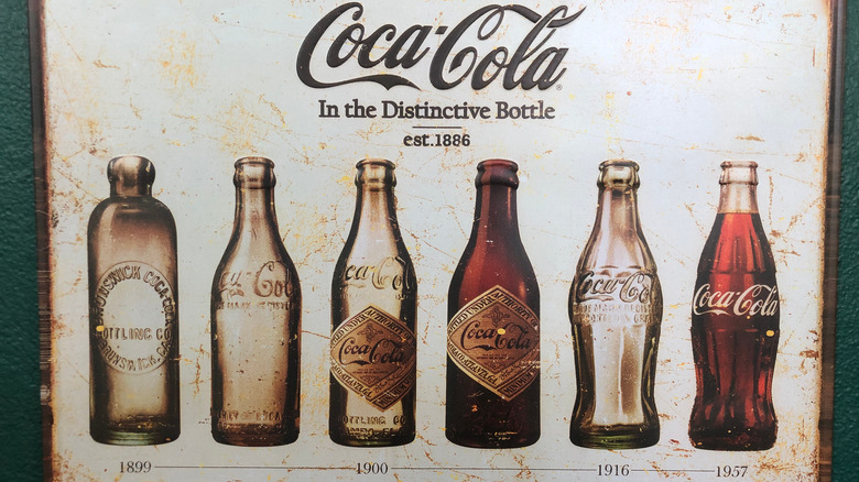 vintage Coca-Cola bottle sign