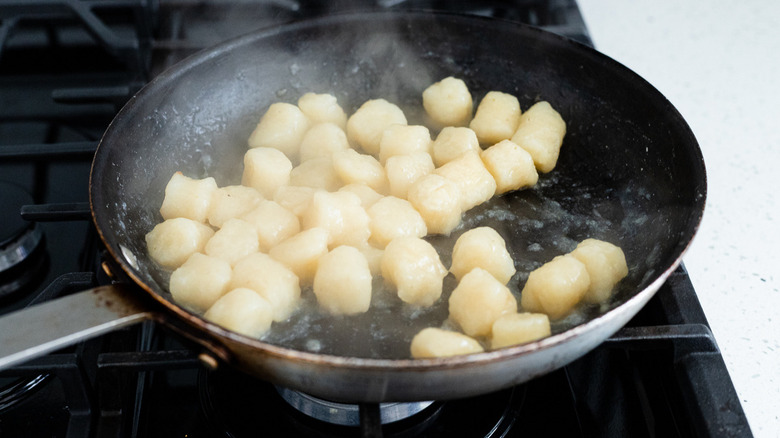 cauliflower gnocchi cooking in a pan