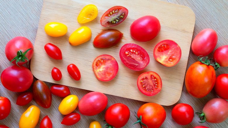 cherry tomatoes on cutting board 