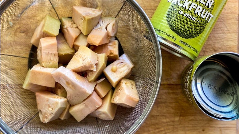 Canned jackfruit chunks in a mesh strainer