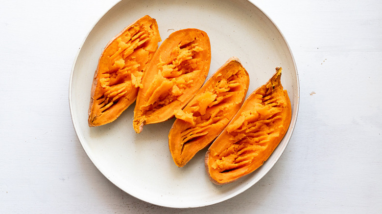 halved sweet potatoes on plate