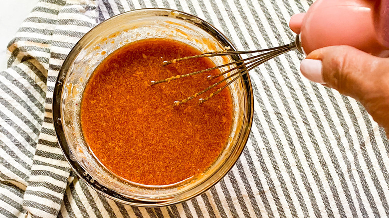 preparing spicy peanut butter sauce