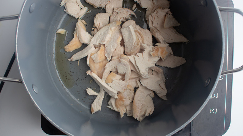 chicken cooking in sesame oil