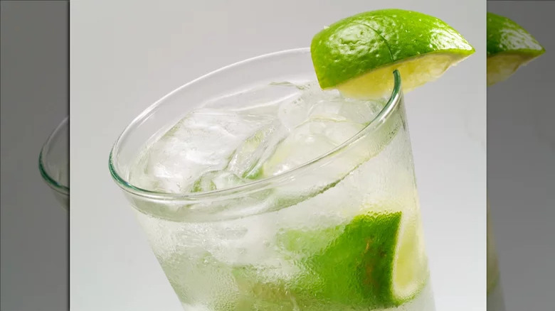 A short glass with a lime-based cocktail