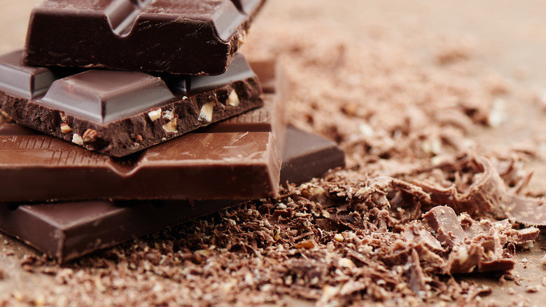 grated chocolate bars on brown surface