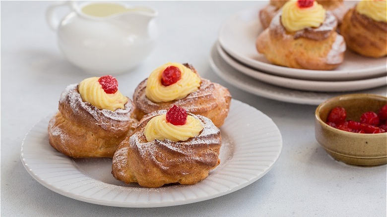 Zeppole pastries with cherries