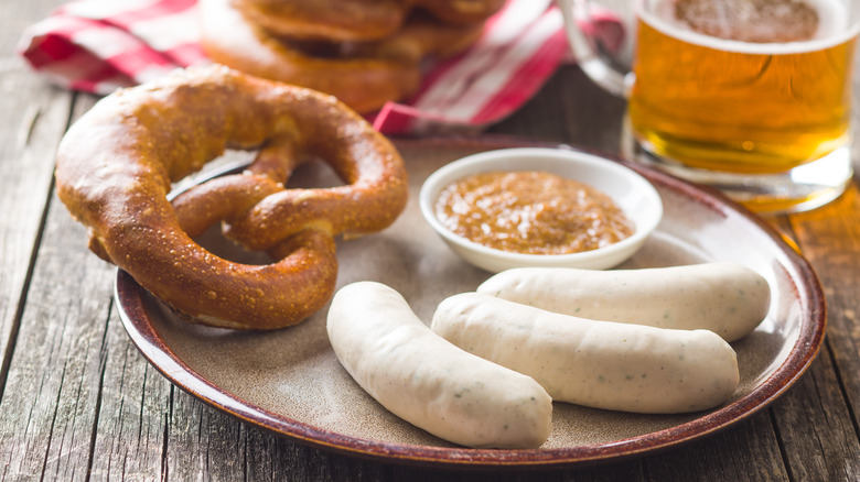 Weißwurste with pretzel and beer