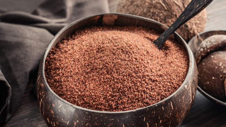 coconut bowl filled with palm sugar