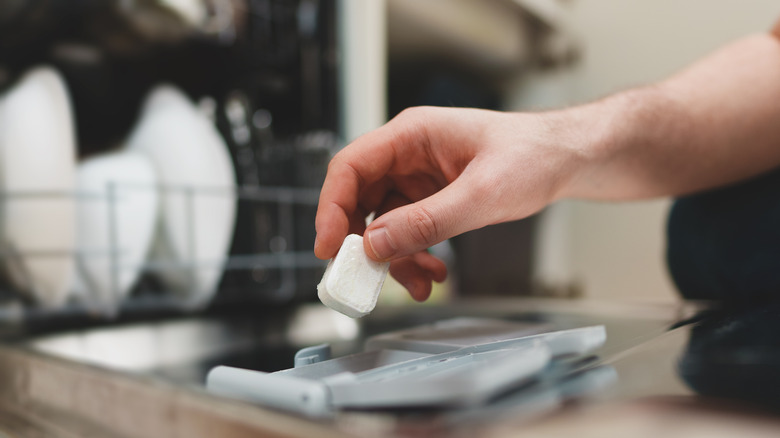 placing detergent tab in dishwasher