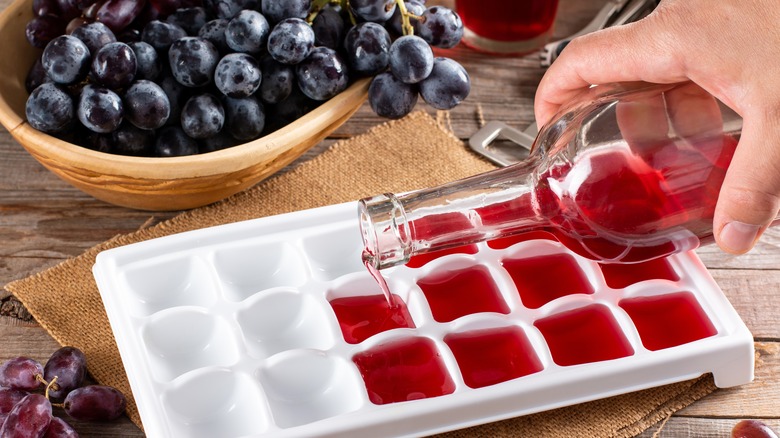 pouring wine in ice cube tray