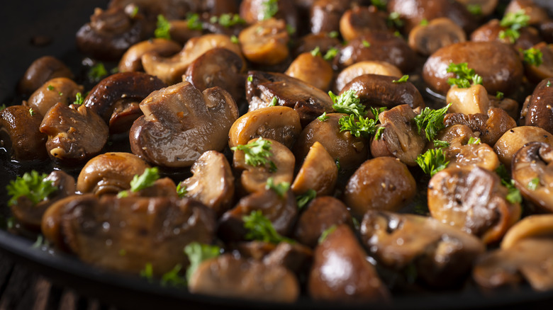 sauteed mushrooms in skillet