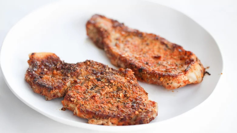 spiced pork chops on a plate