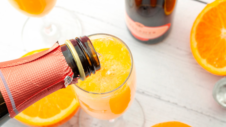 Mimosa with prosecco poured in