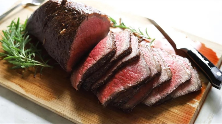 rump roast on cutting board