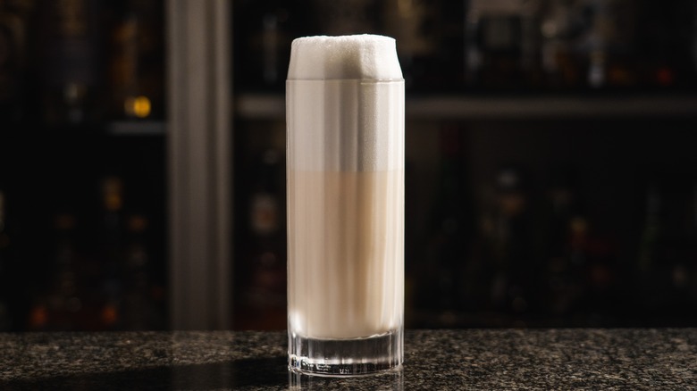 Tall Ramos Fizz with high foam above rim