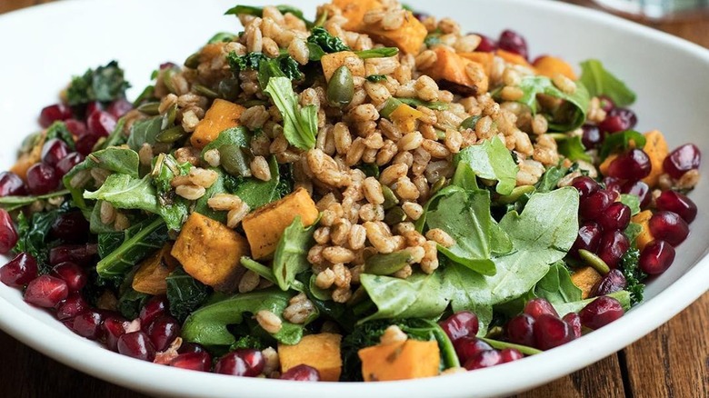 farro roasted veggie bowl with pomegranate