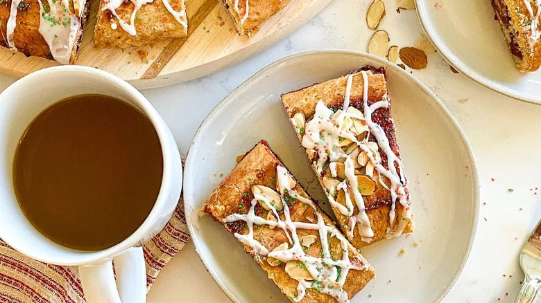 Coffee with almond and icing pastries