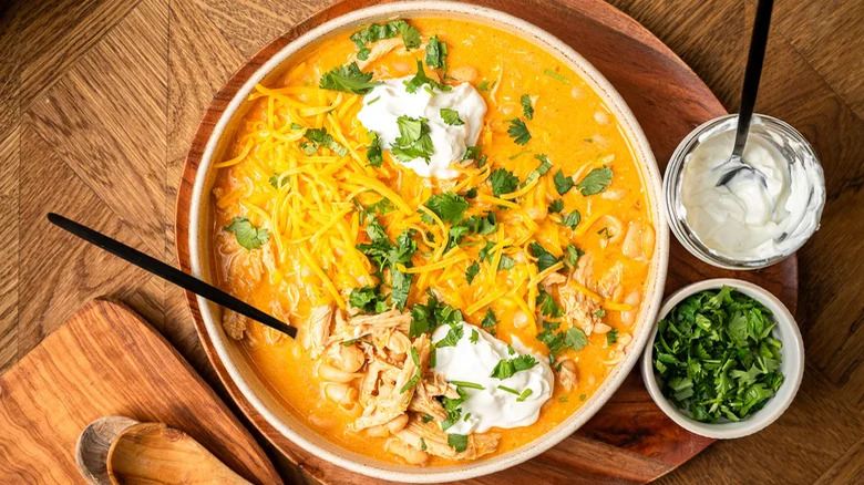 Chicken chili bowl with sour cream and cheese