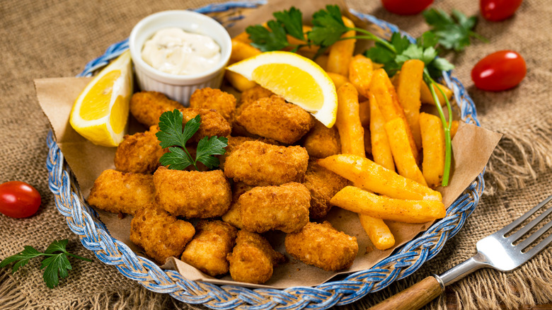 Battered fish nuggets with fries