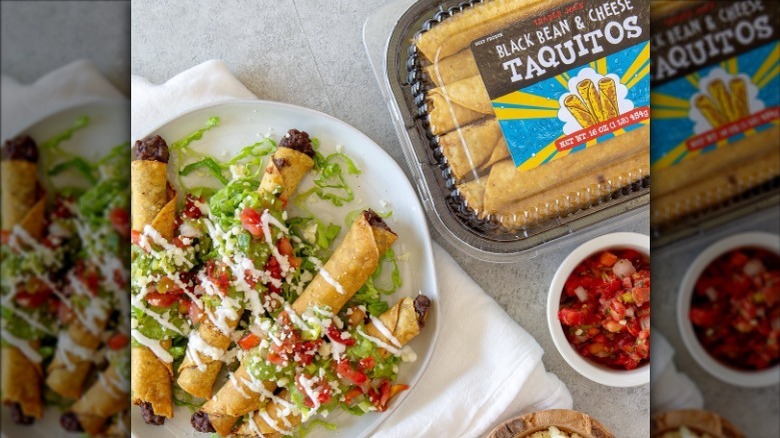 Taquitos on a bed of lettuce