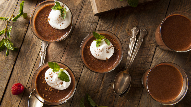 Cups of mousse with whipped topping