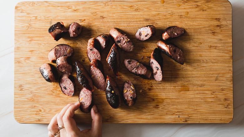 sausage cuts on cutting board