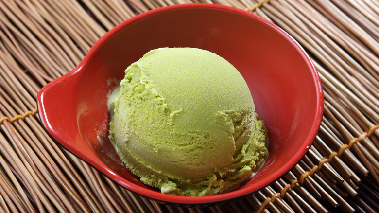 Scoop of matcha ice cream in bowl