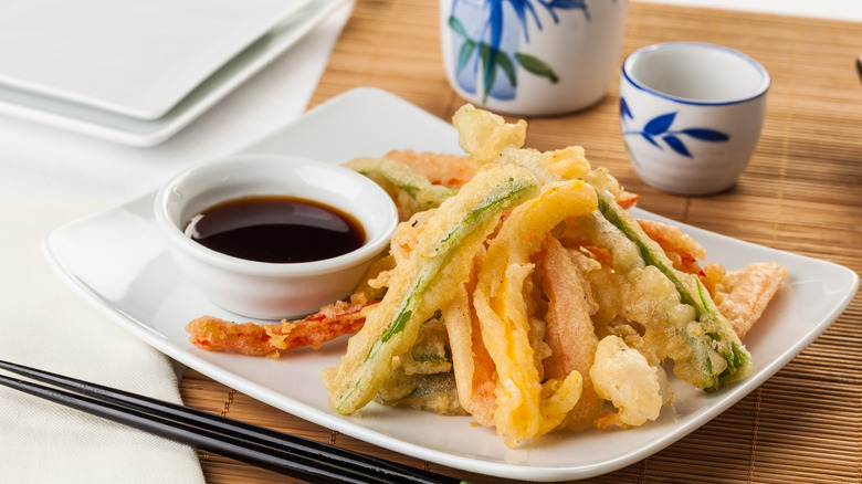 Plate of various tempura with dipping sauce