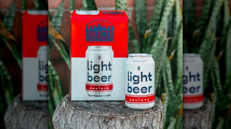 box and can of Societe Light Beer