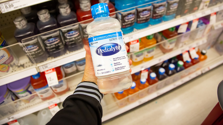 Bottle of unflavored Pedialyte in focus