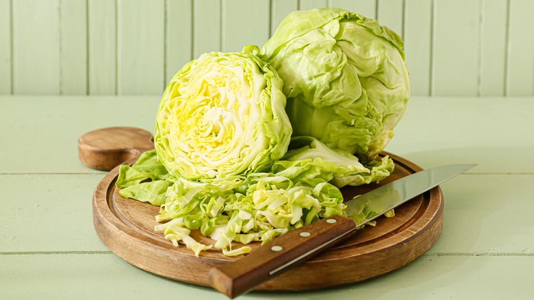 winter cabbage on cutting board with knife