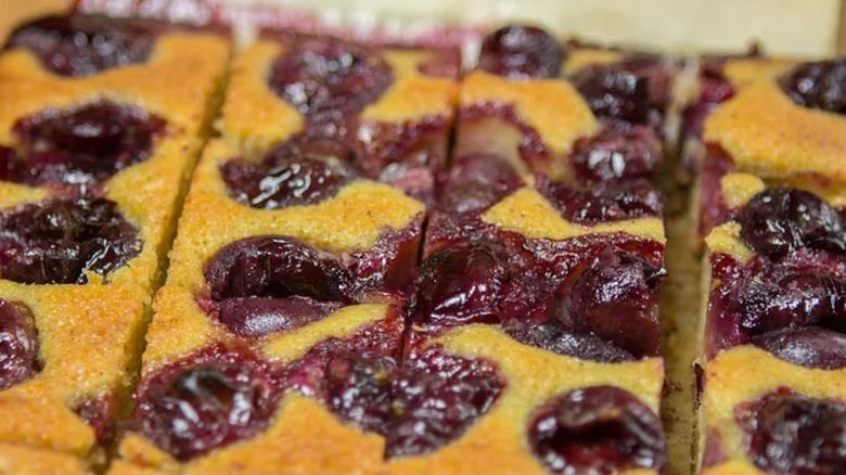 Yellow cake with cherries sliced