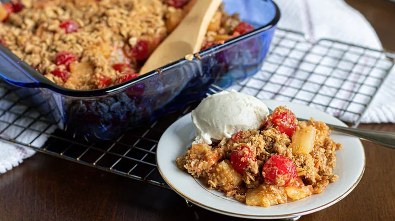 Fruit crisp on plate and in pan