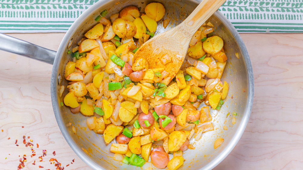 cooking potatoes and onions