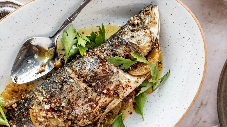 Roasted fish on plate