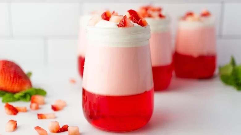 mini jell-o parfait with strawberry garnish