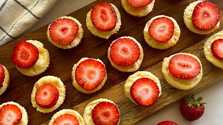 cheesecake bites on wooden board