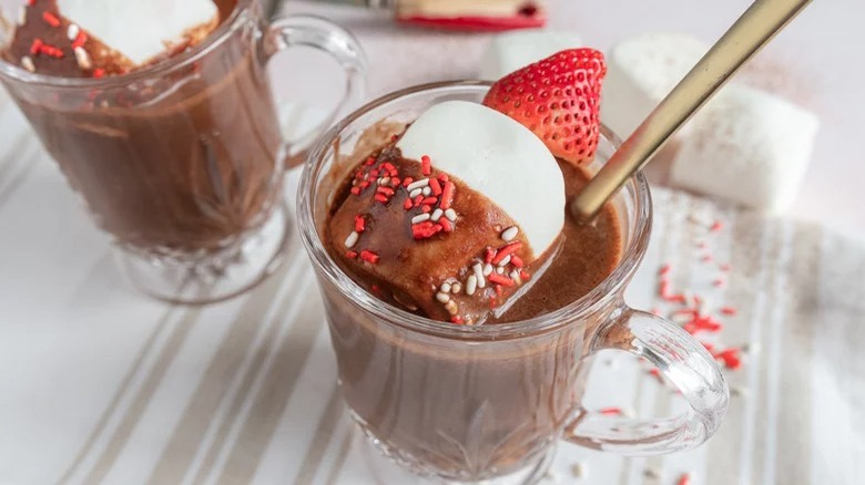 glasses of strawberry hot chocolate with marshmallows