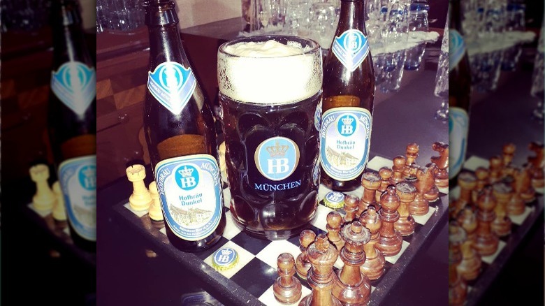 liter of dunkel beer on chess table