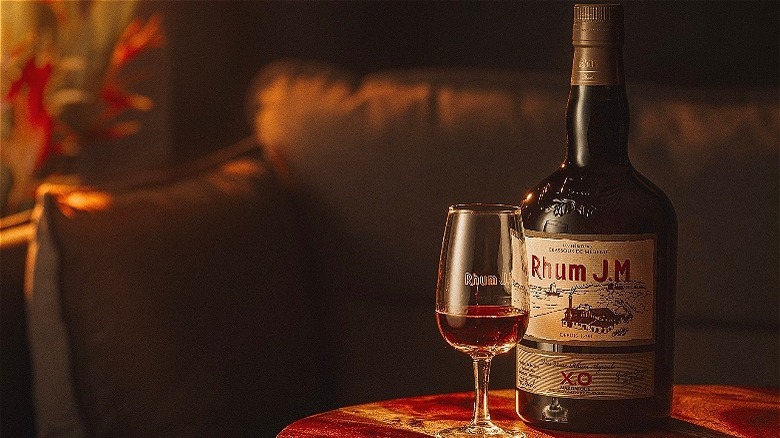 Rhum JM bottle and glass 