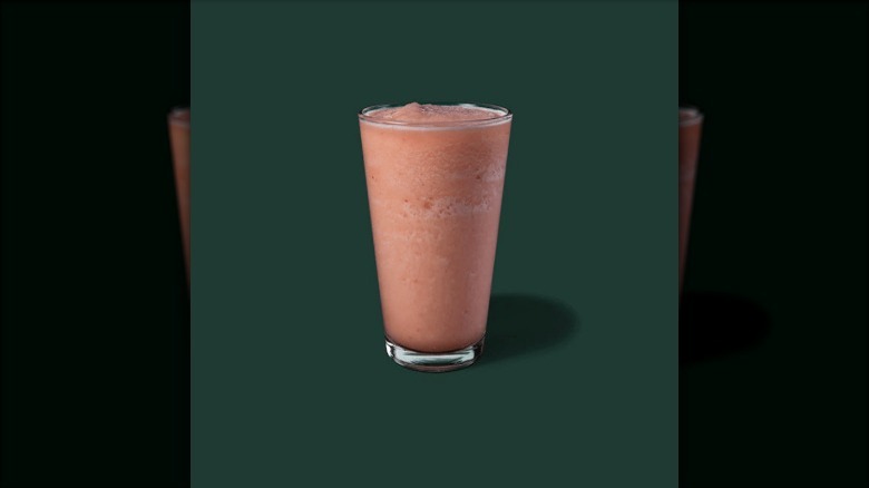 frozen strawberry lemonade on green background