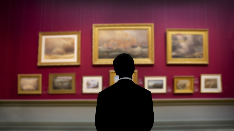 Man viewing art in a gallery