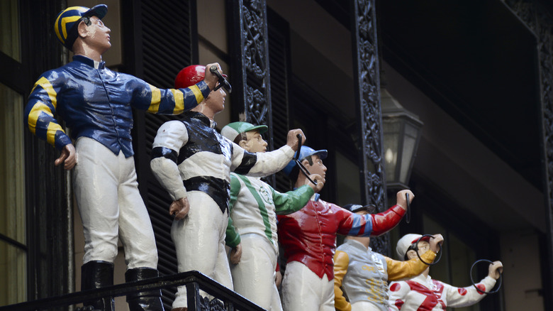 Jockeys atop '21' Club