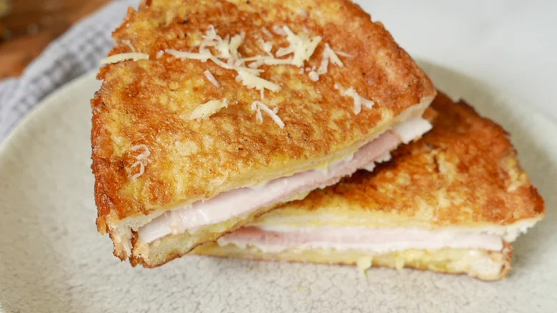 Cheese and ham hot sandwich with egg crust