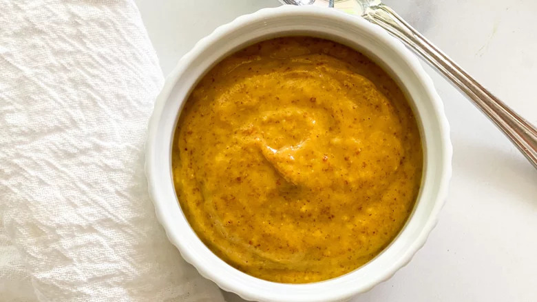 Mustard sauce in ramekin