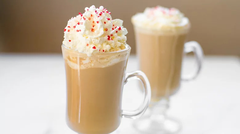 Coffee with whipped cream and sprinkles