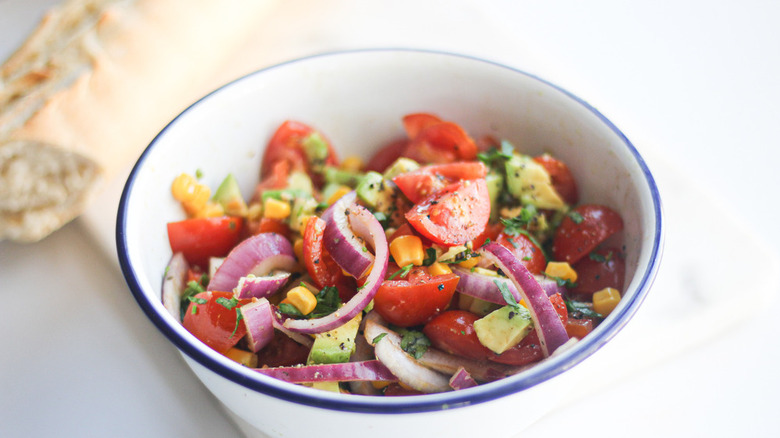 Tomato and avocado salad bowl