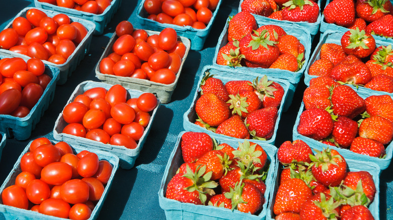 Punnets of tomatoes and strawberries