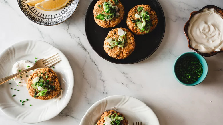 Salmon patties with sour cream and chives